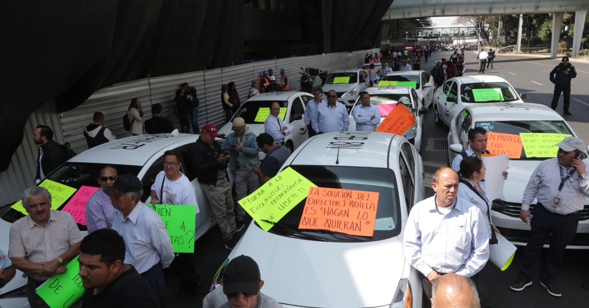 Mexico City airport curbs Uber pickups after protests